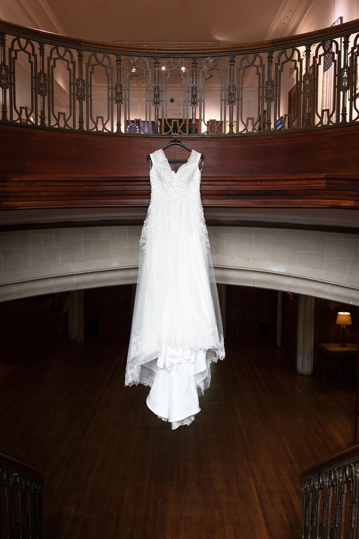 wedding-dress-hanging-in-mansion-staircase-atlanta
