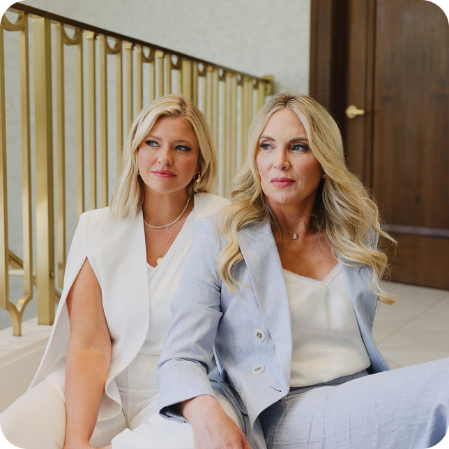 2 blonde girls modeling during their brand photoshoot that Mello Social is directing and executing for their social media. 