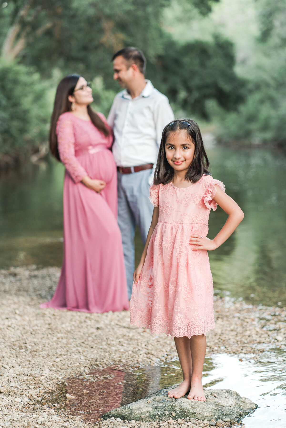 Austin Texas Maternity Photograph of family with water.