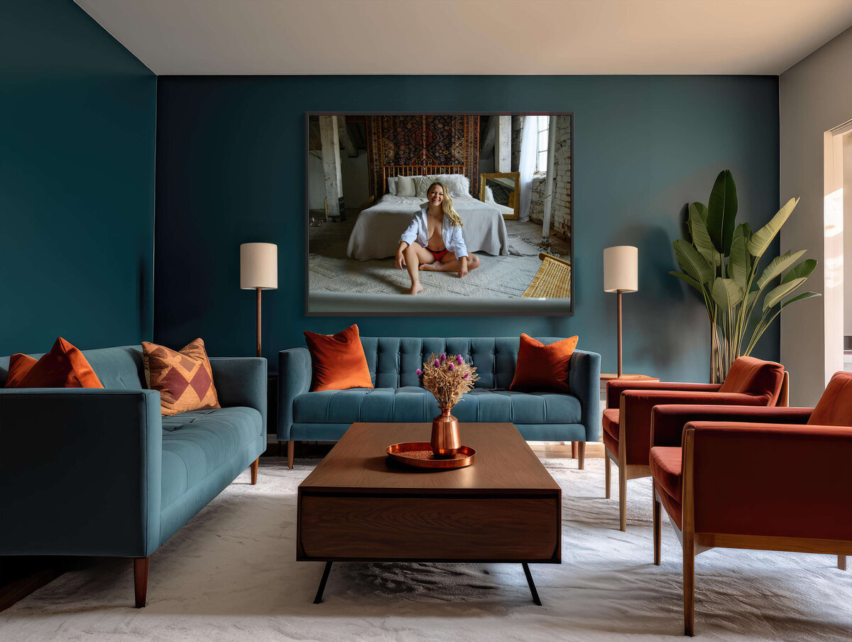 Blue living room with a photo of a woman wearing a white dress shirt.