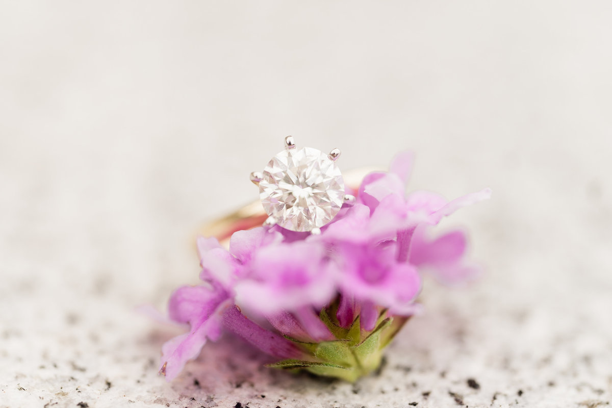 Diamond ring on pink flower