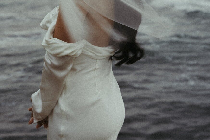 Wedding photographer working with a couple after being discovered through AI visibility strategy