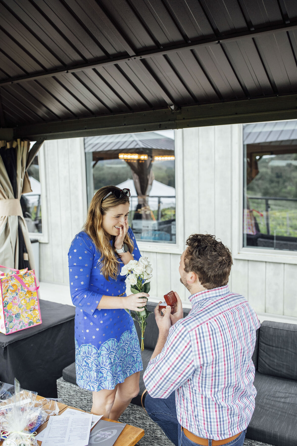 Proposal Photography | Groom-to-be proposing among the vineyards at Old York Cellars during sunset | Ringoes, New Jersey