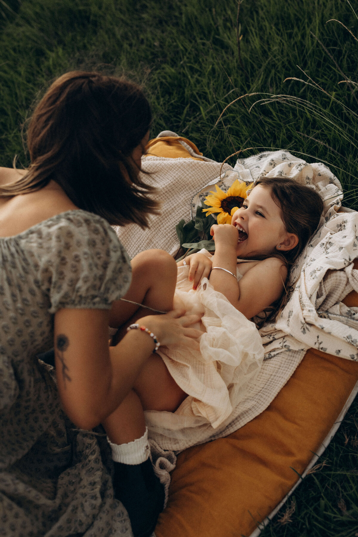 mother-tickling-daughter-photographyjpg