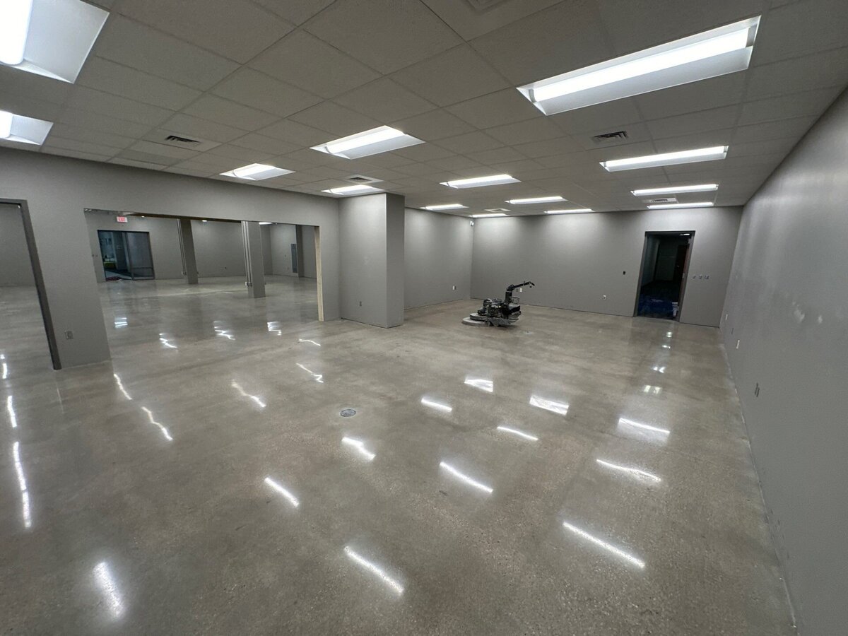 Commercial concrete polishing services in DFW, featuring professional-grade polished floors for businesses and commercial spaces.