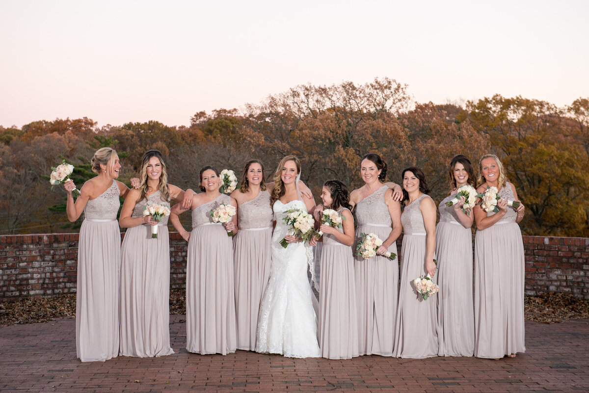 bride and her bridesmaids outside Heritage Club at Bethpage