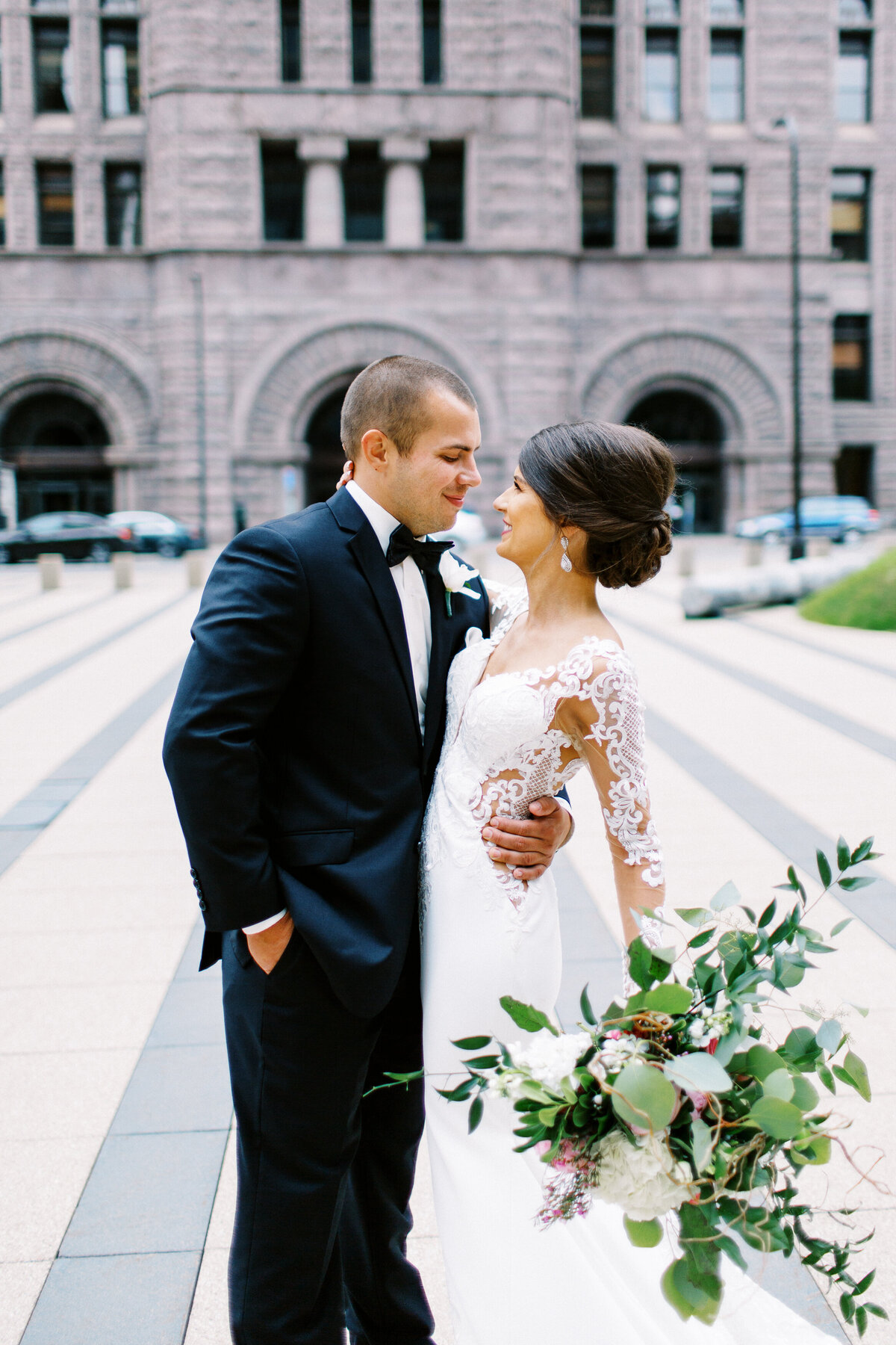 Bride and groom looking at each other