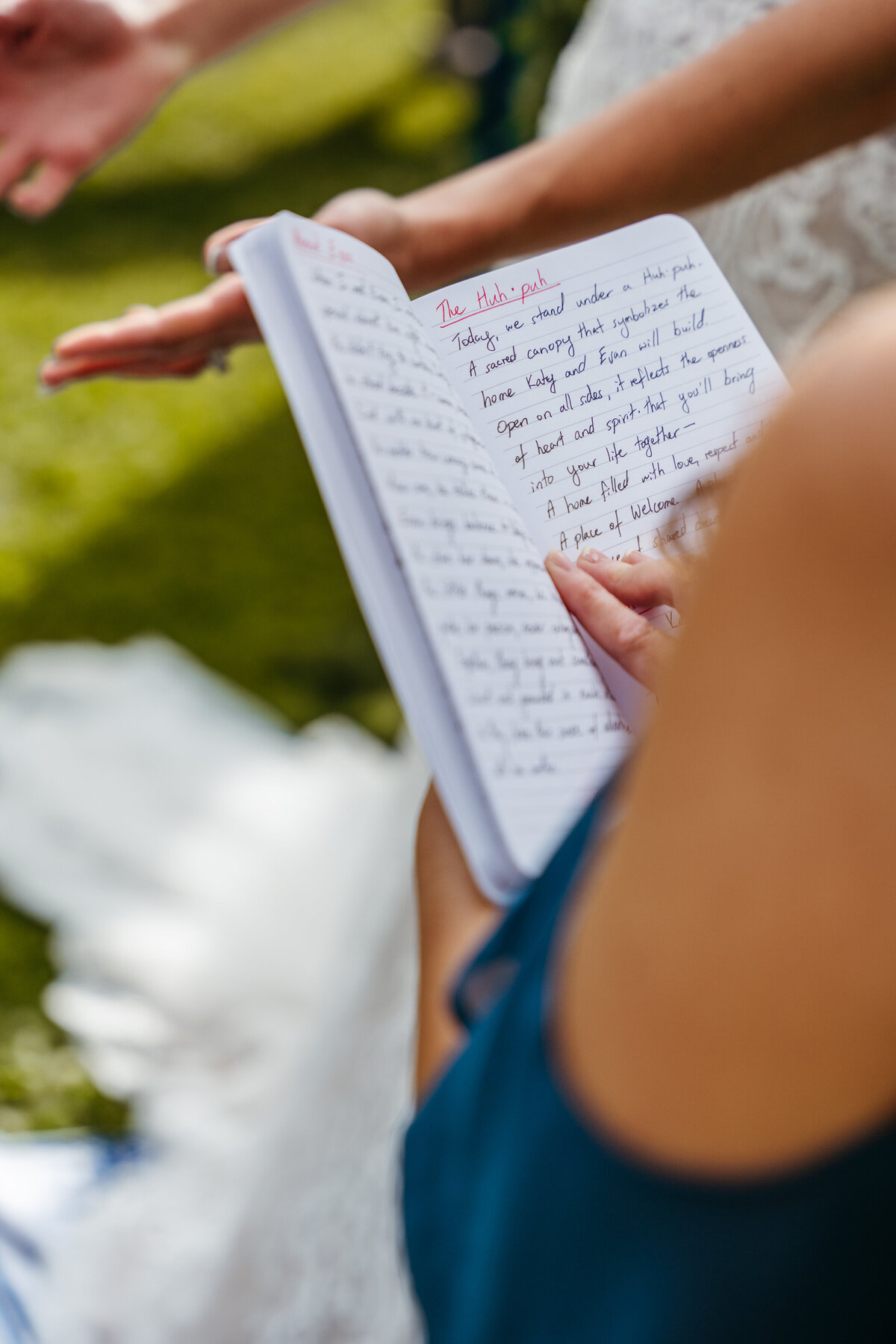 Couple exchanging vows beneath lace chuppah in the Dolomites