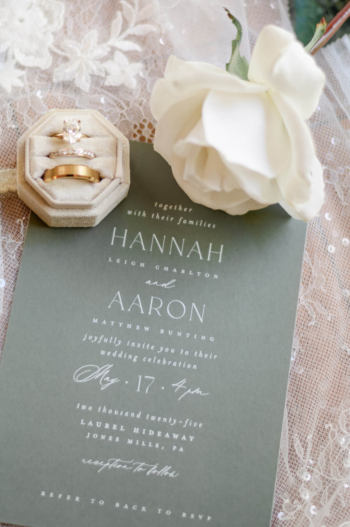 Timeless wedding photography details of invitation, velvet ring box, and rose captured by Pittsburgh wedding photographer Bree Stewart.