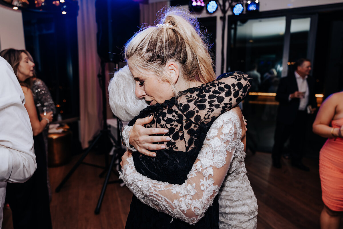 Nashville wedding photographer captures bride hugging grandma