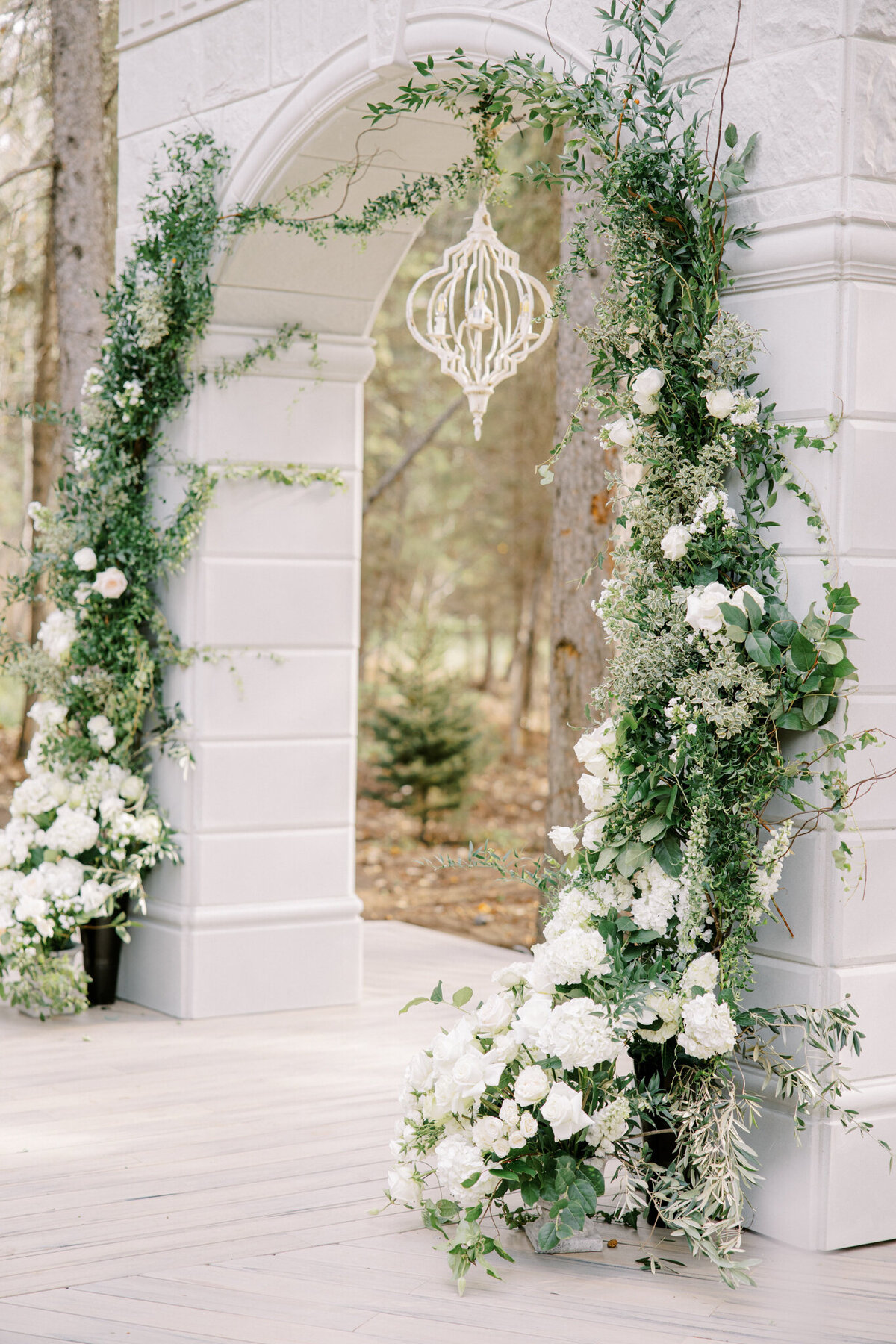 Ceremony arch at Archway Manor Weddings & Events, elegant, timeless, European-inspired Red Deer, Alberta wedding venue, featured on the Brontë Bride Vendor Guide.