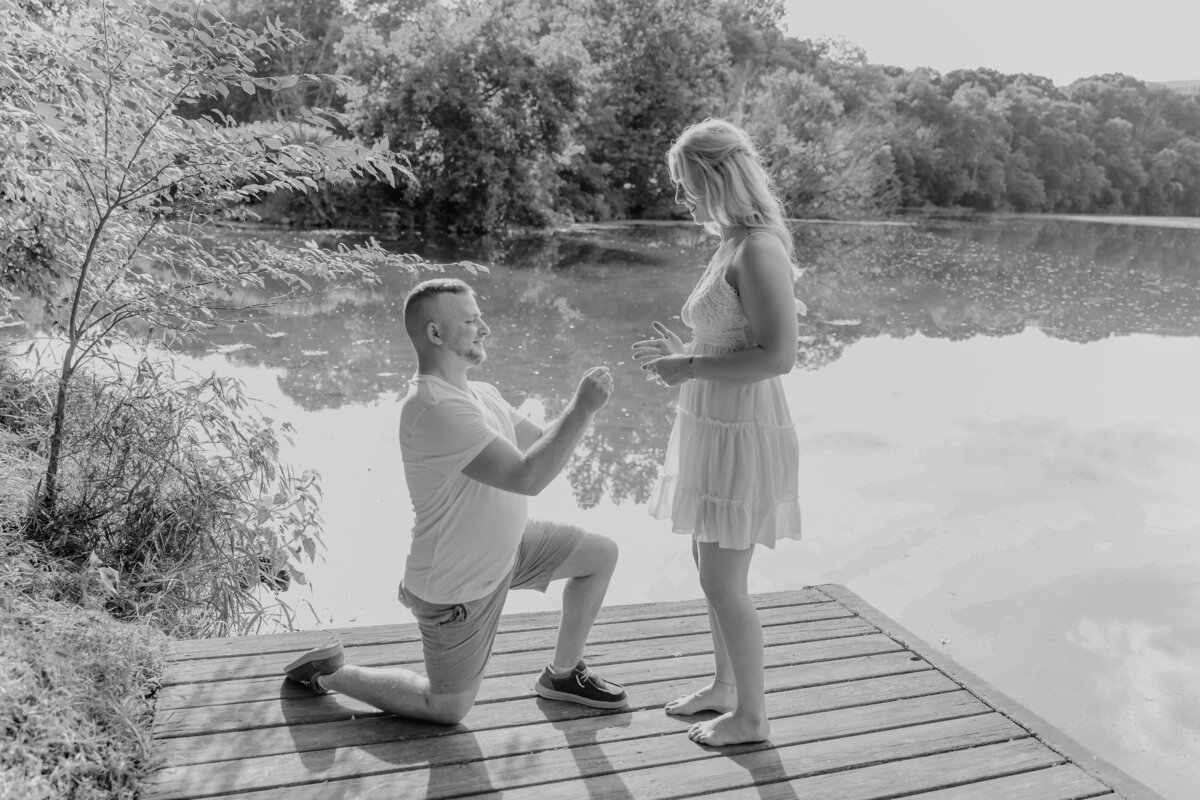 Surprise engagement proposal on the banks of the Shenandoah River in Virginia, with stunning waterfront views at sunset