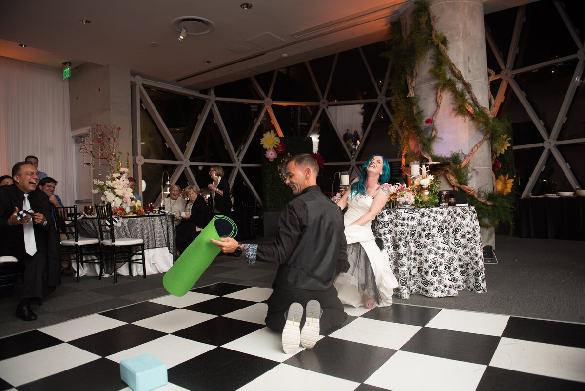 44 - Dali Museum St. Pete Wedding Reception Garter Toss - Tampa Bay Wedding Planner