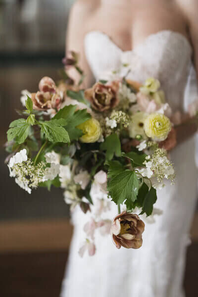 Bride holding bouquet by wedding planners chicago il