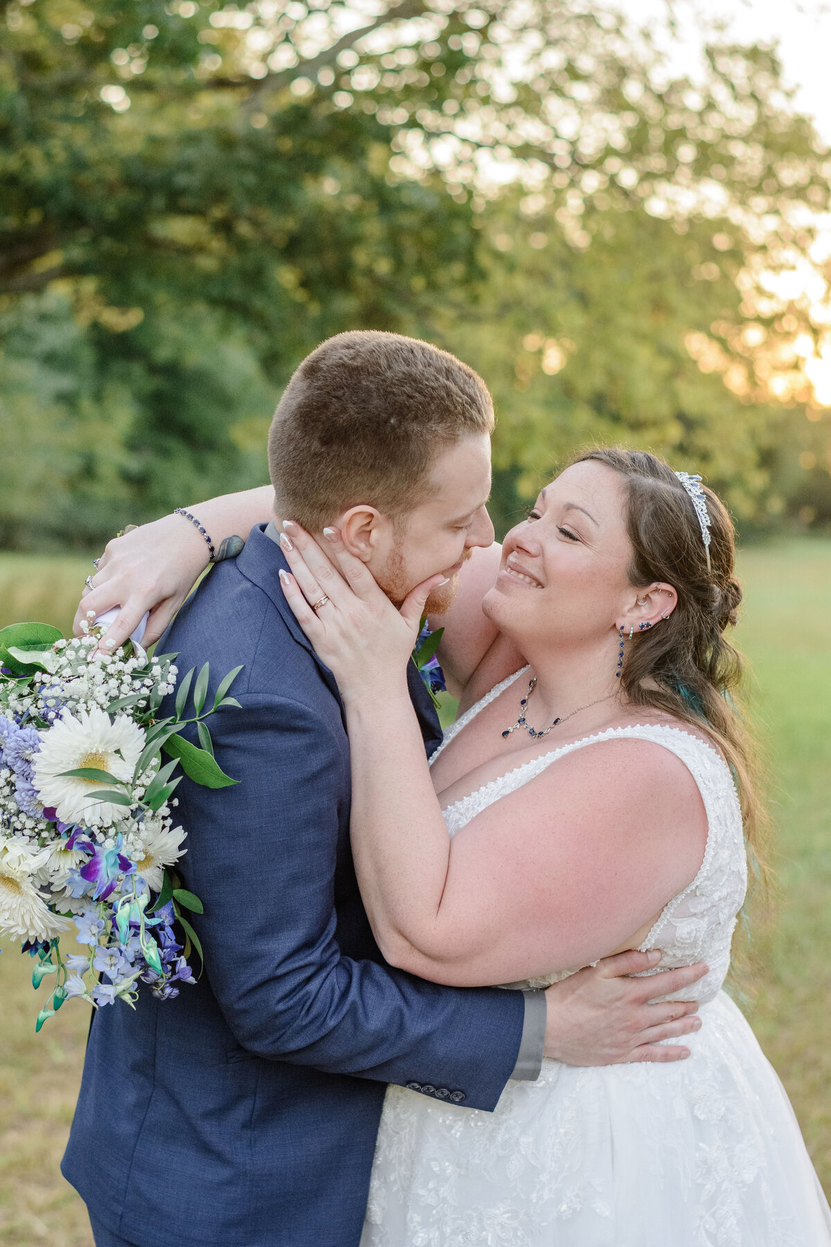 Ashley Hall Photography couple sharing a sunset kiss
