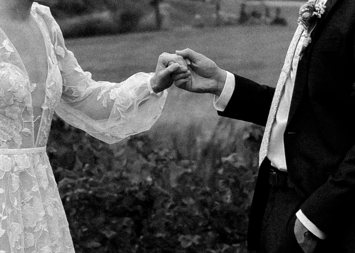 Bride and groom upclose intimate details hands