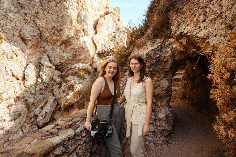 Two young females are photographed while working on Sicily, Italy