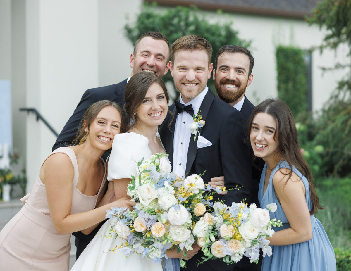 Wedding party portraits at Twenty and Creek, the bridesmaids in blue and blush