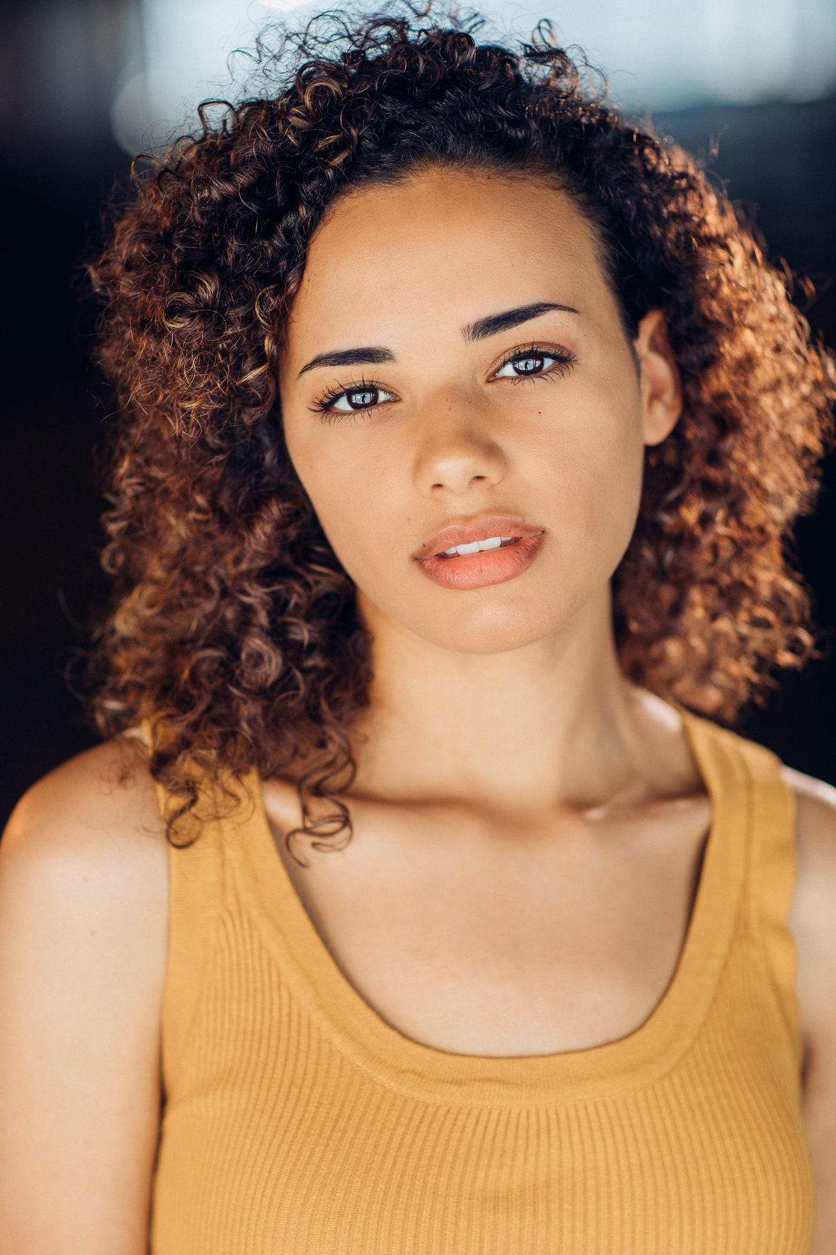 Headshot Photograph Of Young Woman In Yellow Sleeveless Los Angeles