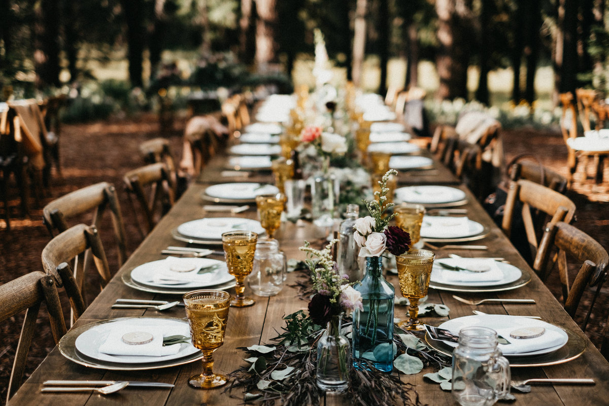Tahoe Wedding Planners farm table with amber glasses at summer wedding venue Mitchell's Mountain Meadows Sierraville near Truckee, Joy of Life Events image by Lukas Koryn