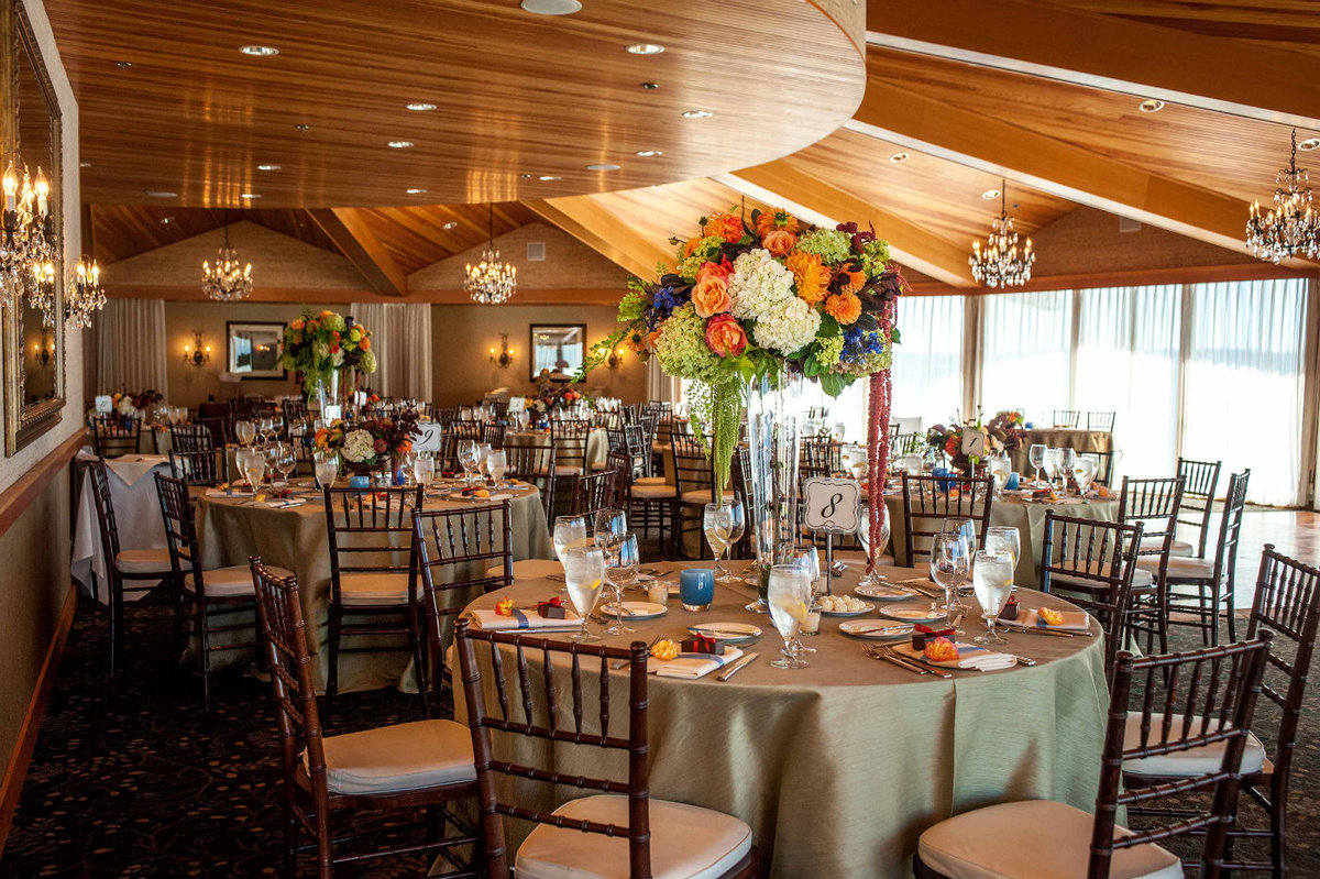 fall wedding reception tables with champagne linens and brown Chivari chairs