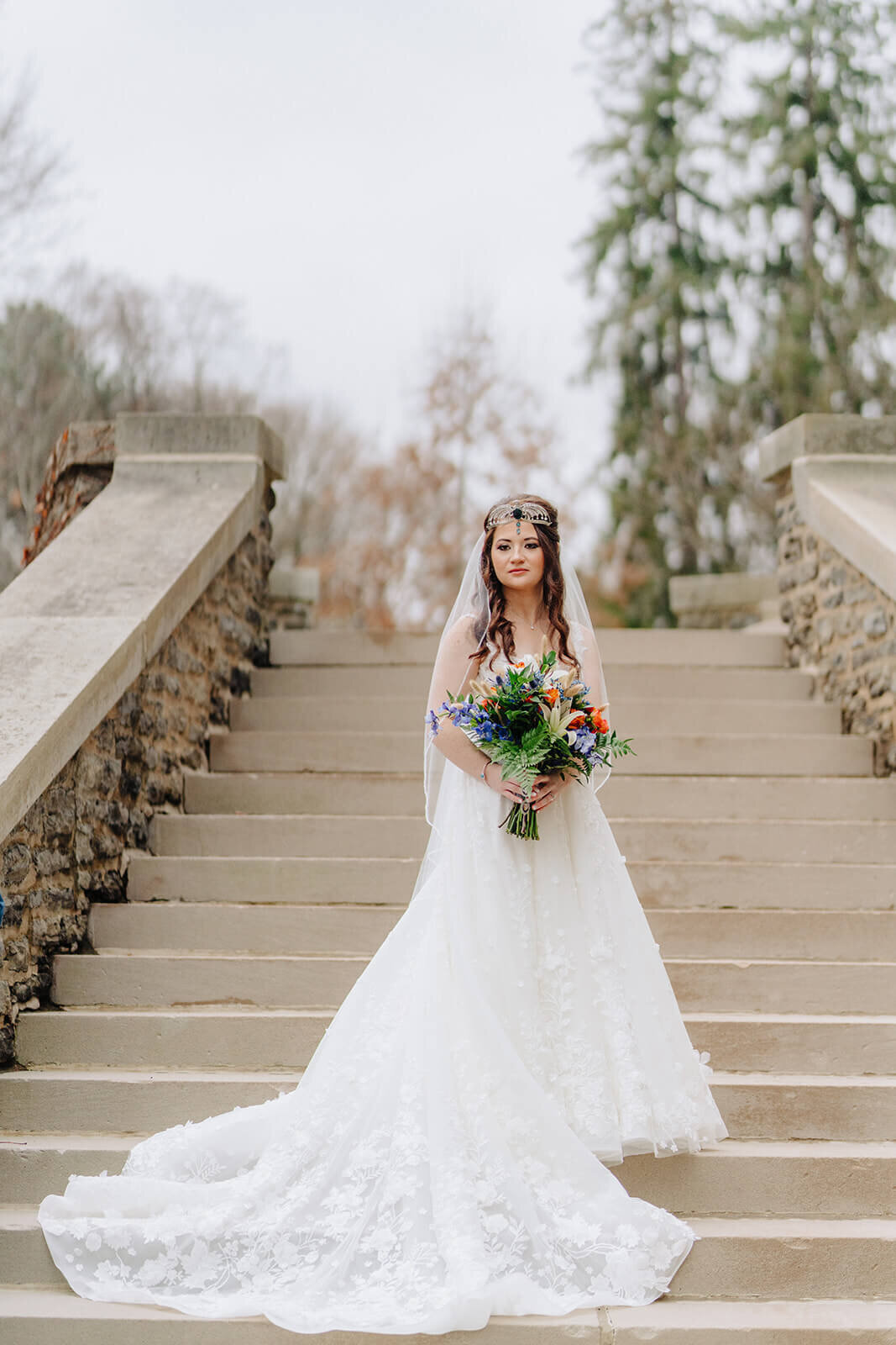 Bridal portrait on the steps outside of  Otesaga Resort