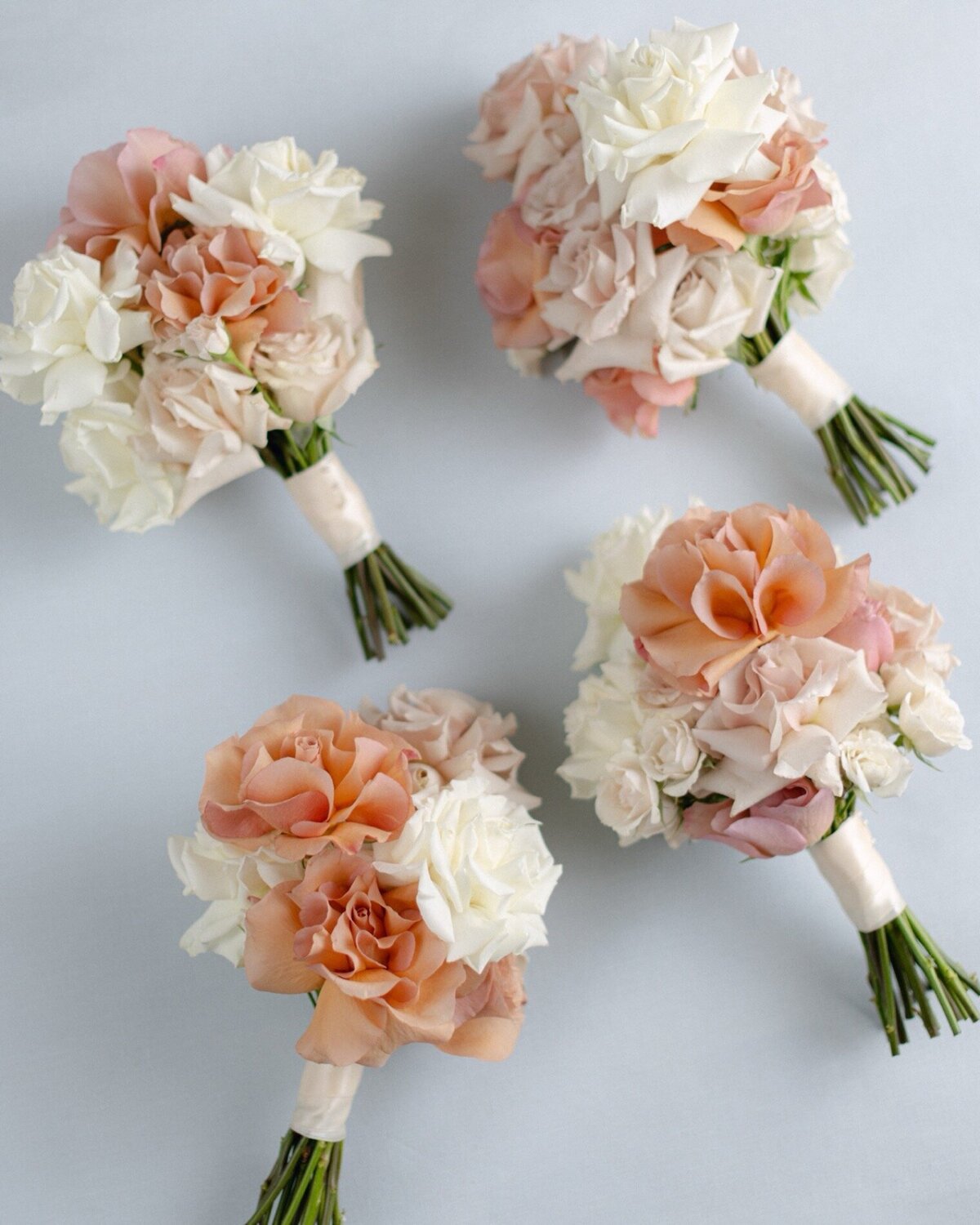 peach-white-spray-rose-button-holes-wedding