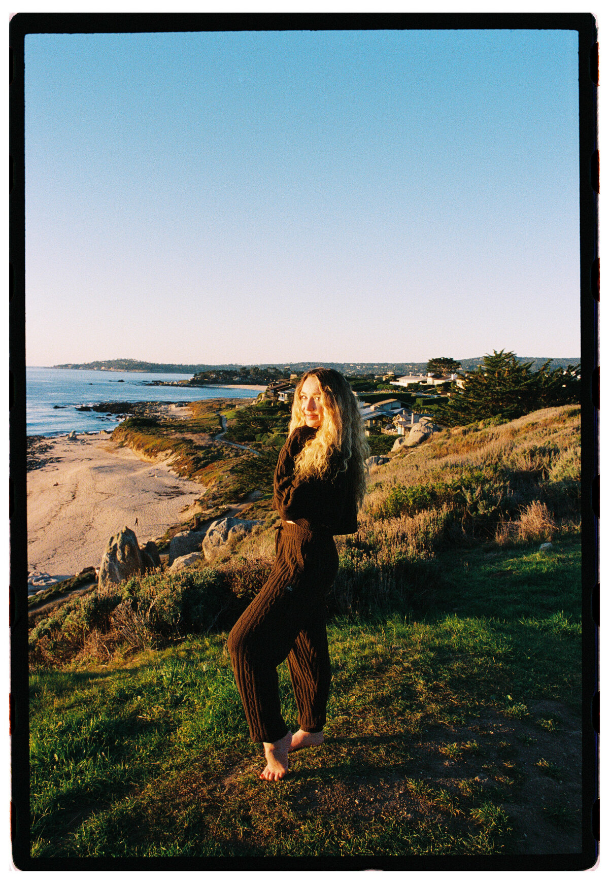Portrait taken at Ribera Beach in Carmel, captured on film by Kate Winters Photography, showcasing an authentic and candid moment.