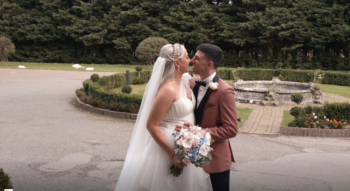 The Bride and Groom on their wedding day. From the wedding highlights film shot at Pendley Manor, Hertfordshire by Hertfordshire wedding videographer HC Visuals.