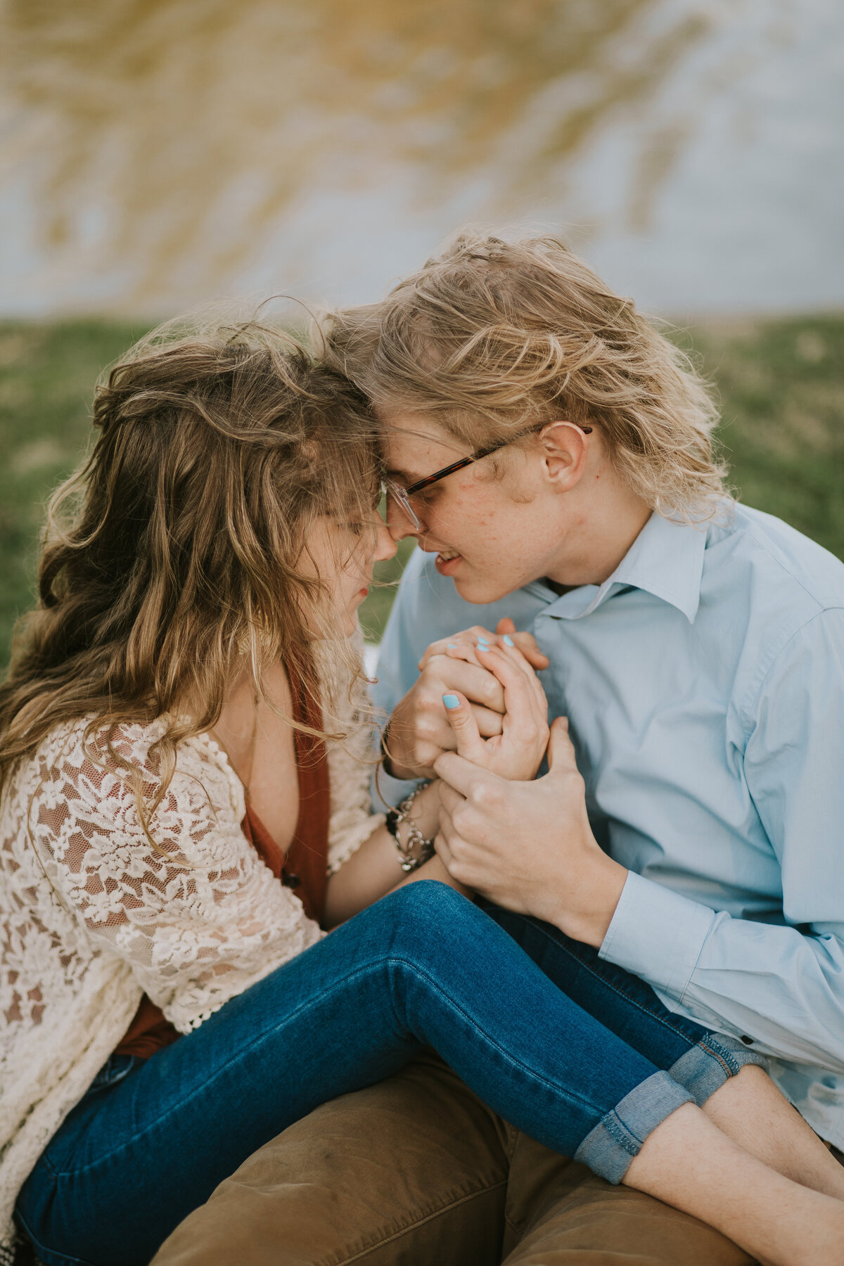 engagement photos of couple holding each other