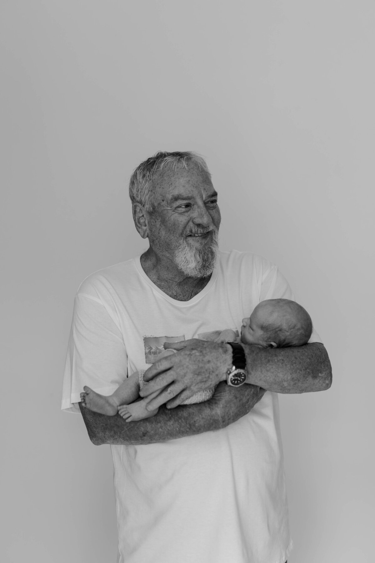 Newborn Baby and Grandfather