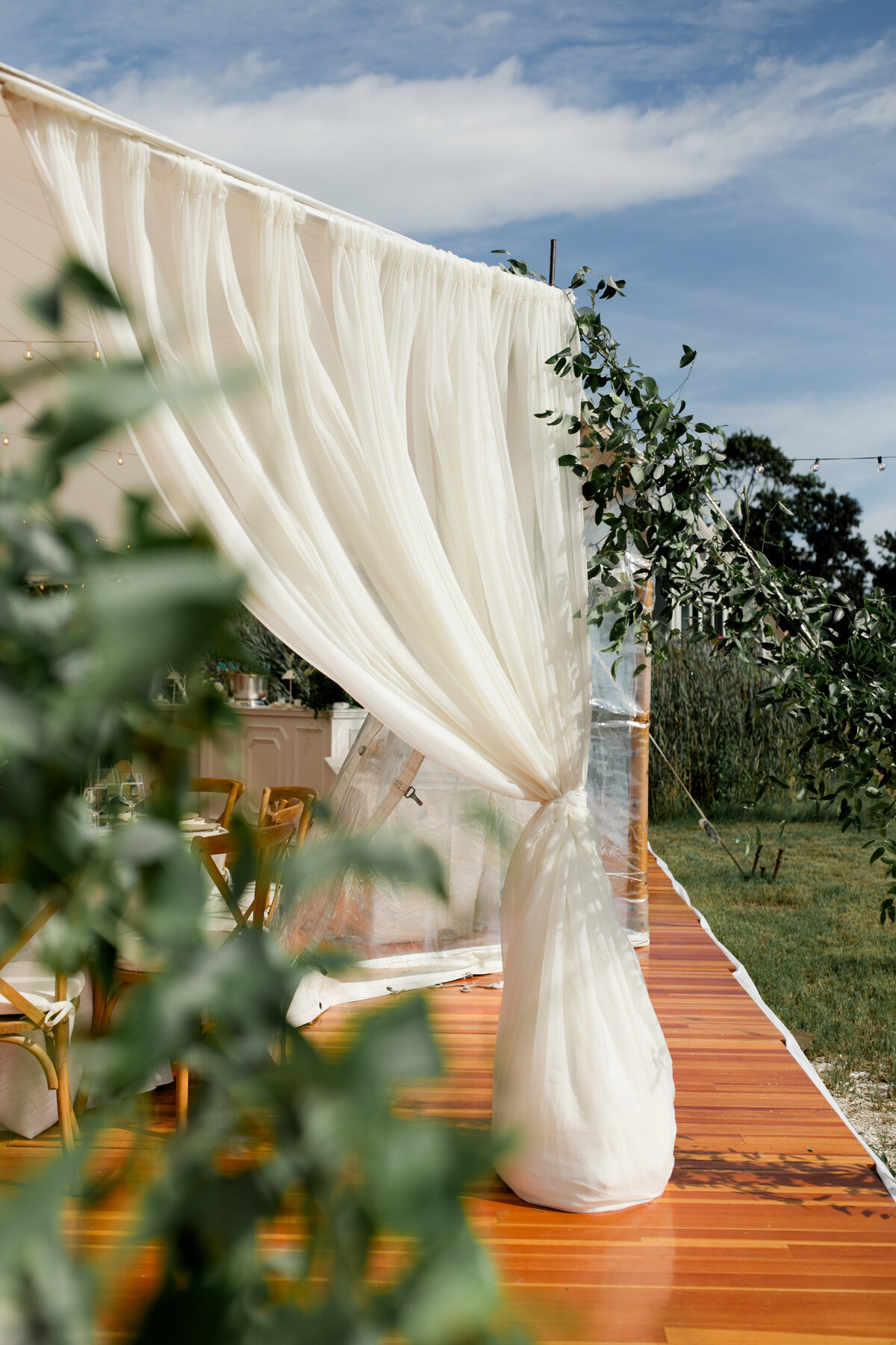 ct-tent-wedding-drapery-and-greenery-entrance
