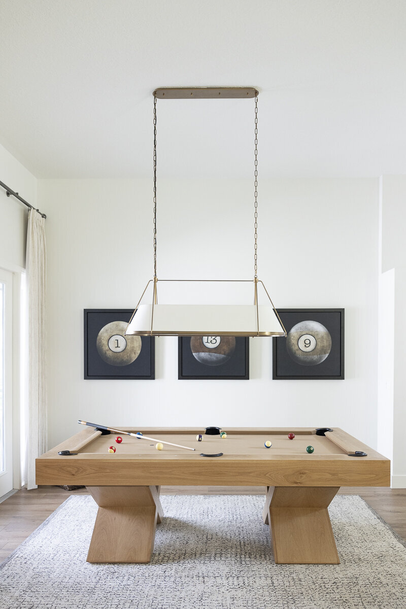 dewine design interiors belle isle project pool table with black picture frames