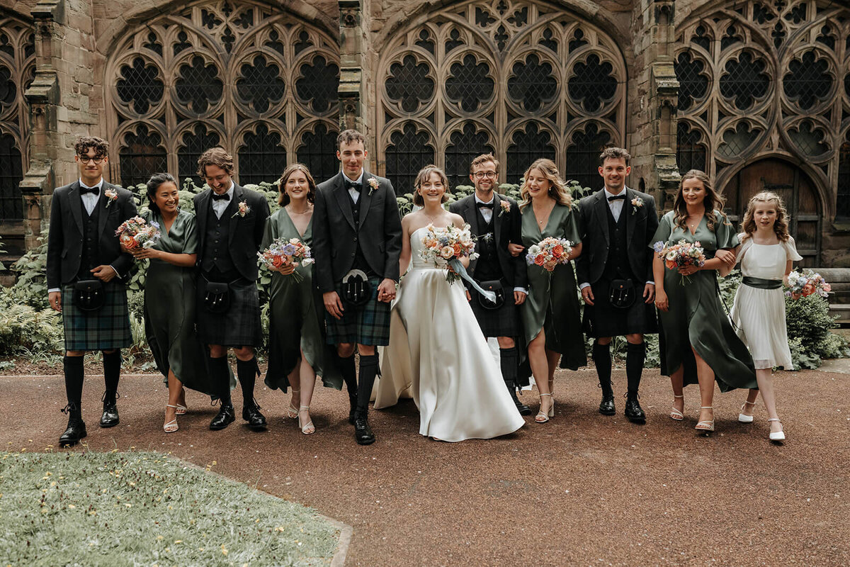 The wedding party outside Herefordshire Cathedral