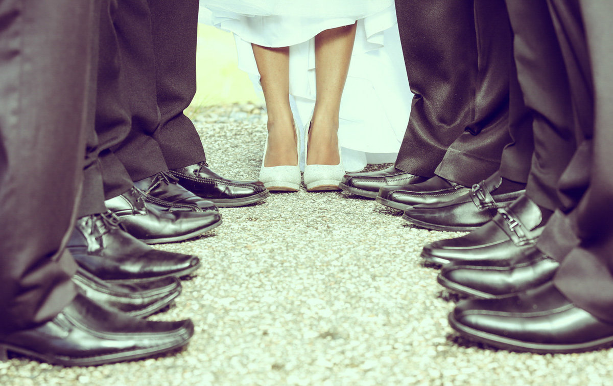 Feet of bride and groomsmen. Photo by Ross Photography, Trinidad, W.I..
