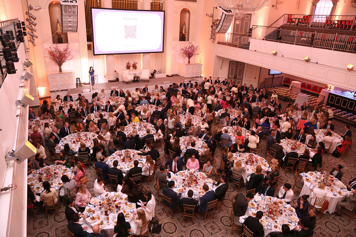Overhead view of the packed ballroom with round tables set for the BCNY Annual Luncheon 2025 in New York.