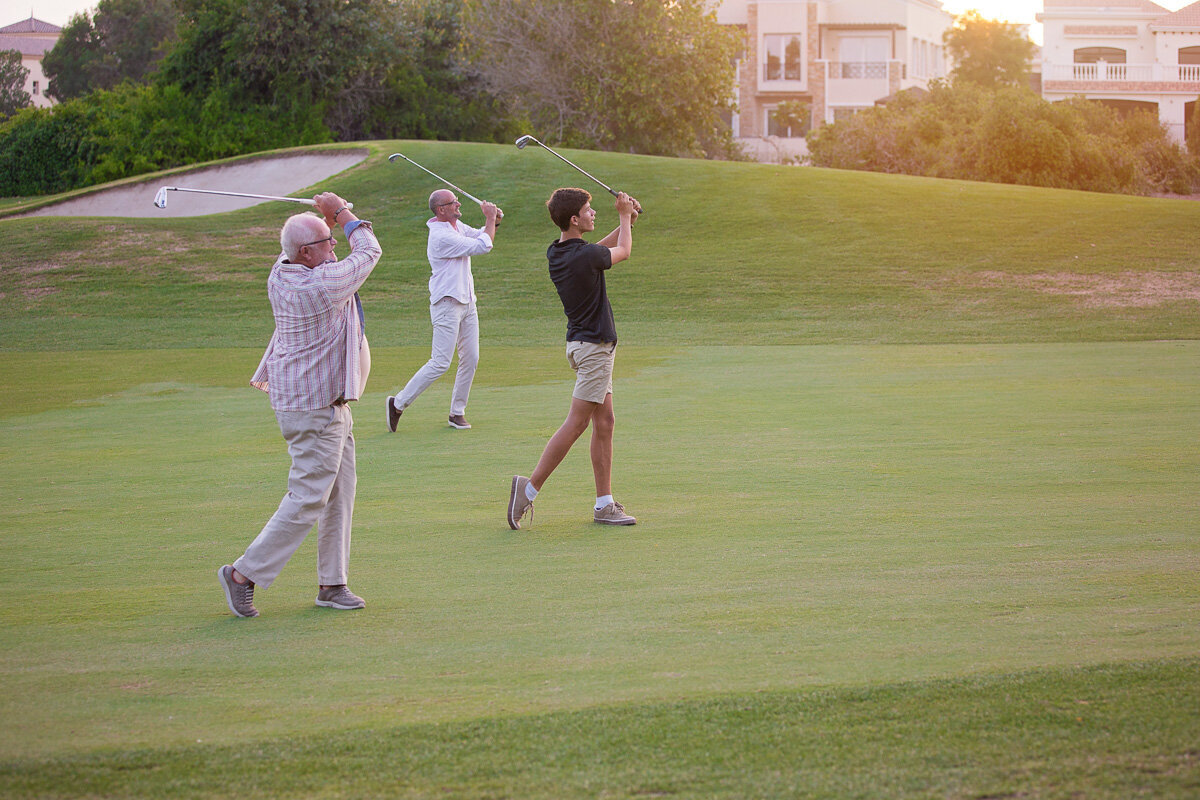 family-playing-golf