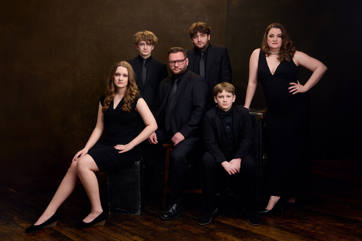 Formal Family Portrait of Six People in Coordinated Black Outfits-77