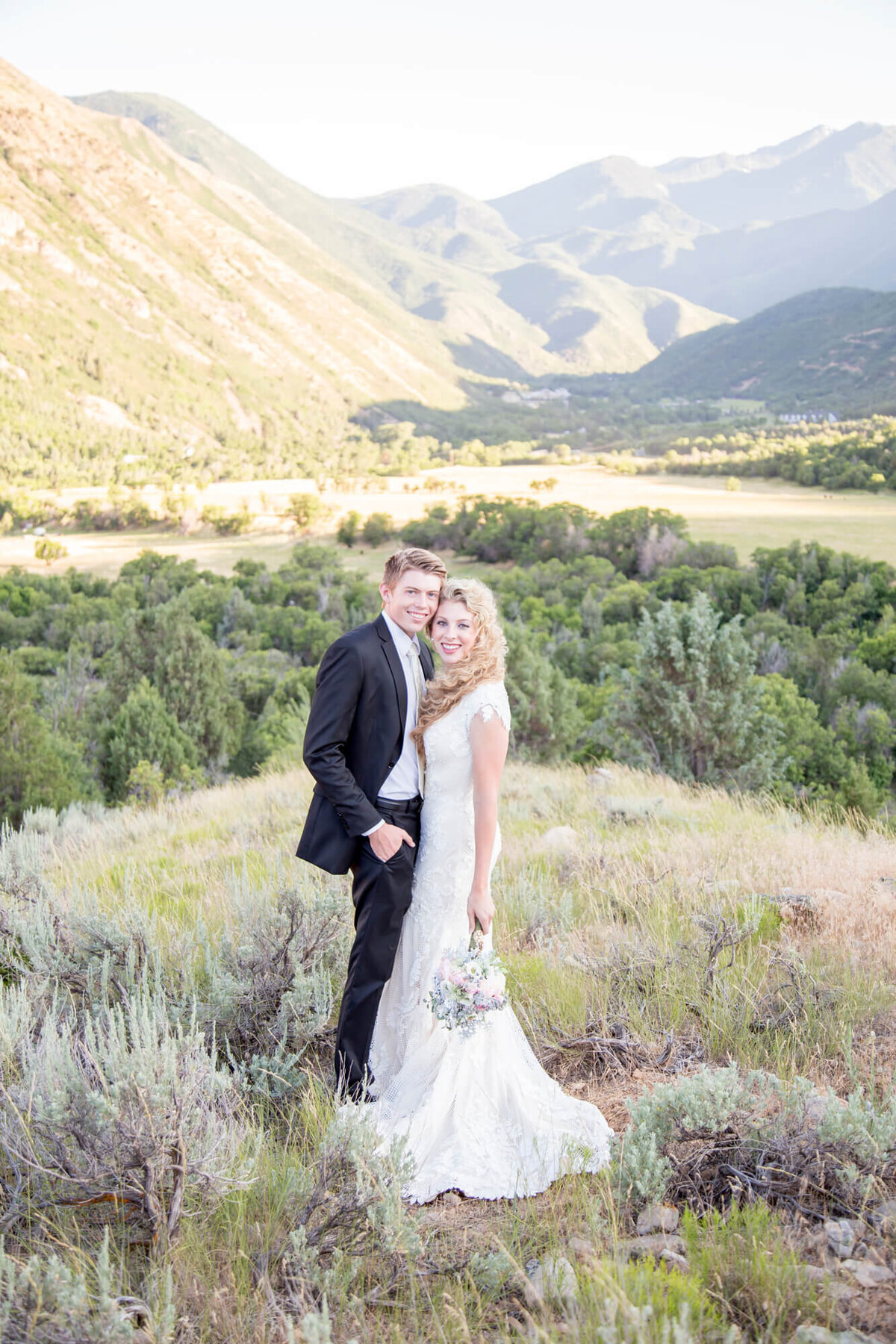 a wedding couple in the mountains