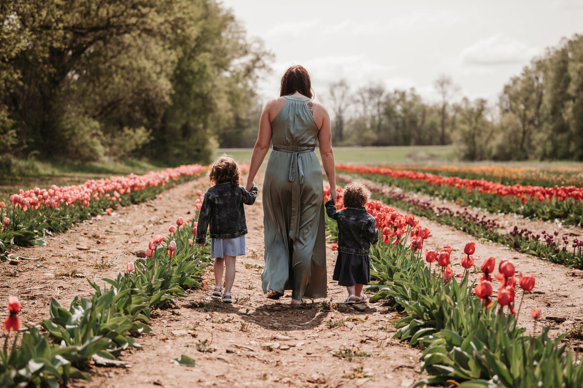 Mom and daughters holding hands westmoreland