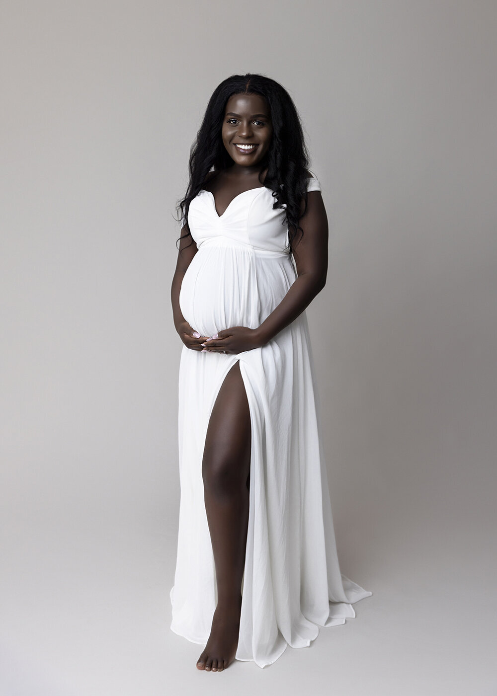 MATERNITY_PREGNANTWOMAN_BLACKWOMAN_WHITEDRESSBABYBUMP