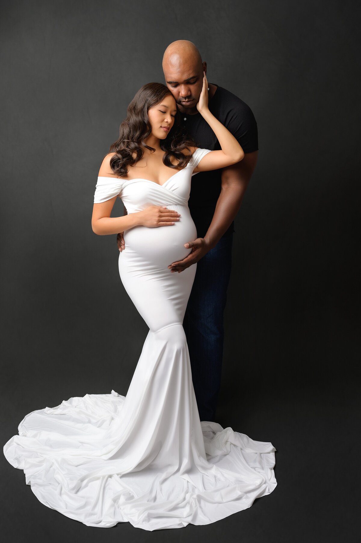 Husband and wife pose for vogue style photoshoot in Miami, FL.