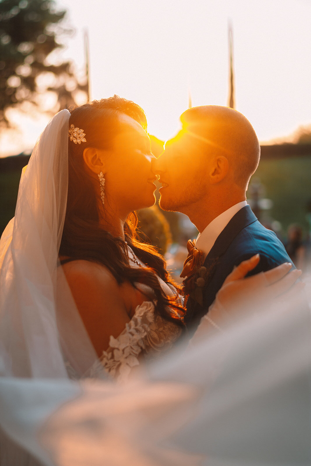 sunset kiss bride and groom