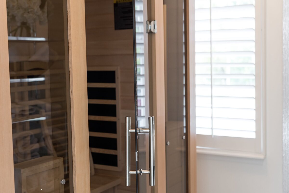 dewine design orlando interior designer modern lakehouse sauna door and silver handle