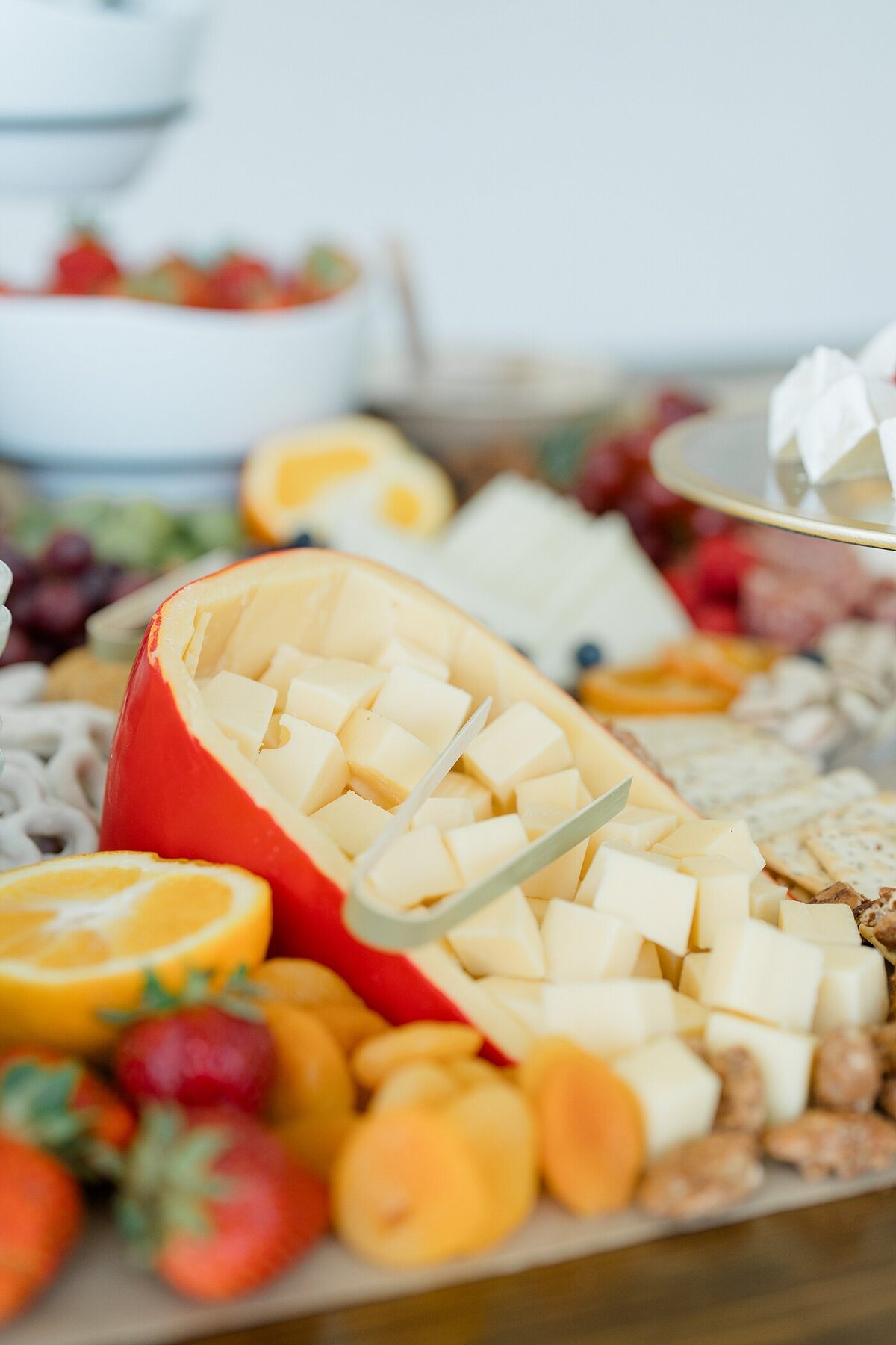 catering food service branding photography with cheese cubed and surrounded by fruit on a charcuterie board  photographed by Columbus photographer