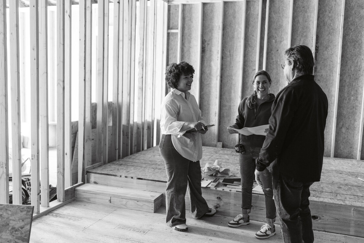 2 female interior designers talking with a general contractor, best interior designer in dripping springs