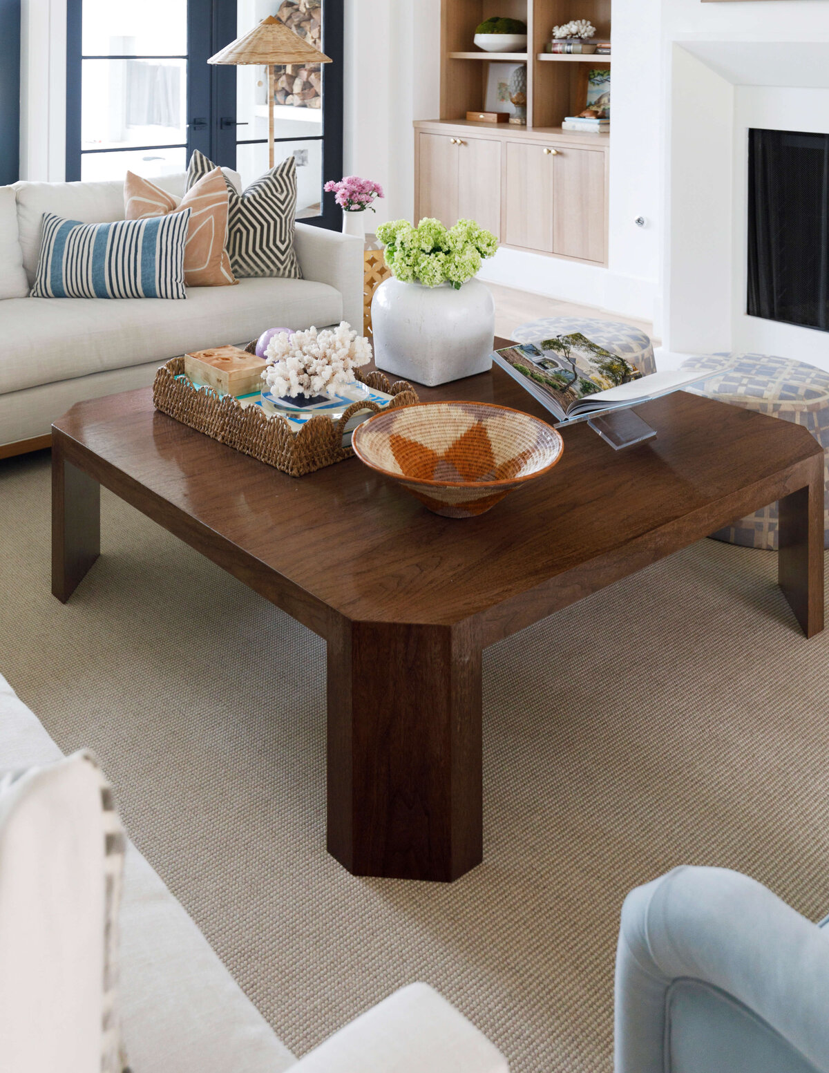 oyster creek studios missouri city new build mahogony coffee table with white couch in living room