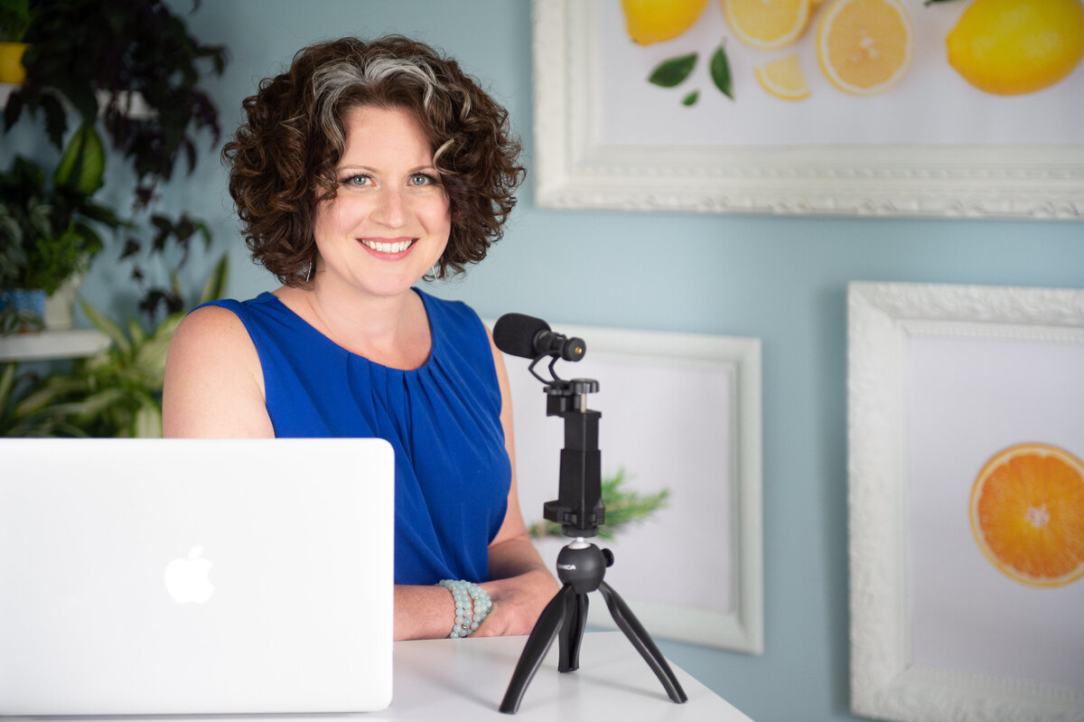 a photo of a DoTerra wellness advocate in front of her computer in her home office.  Captured by Ottawa Branding Photographer JEMMAN Photography Commercial