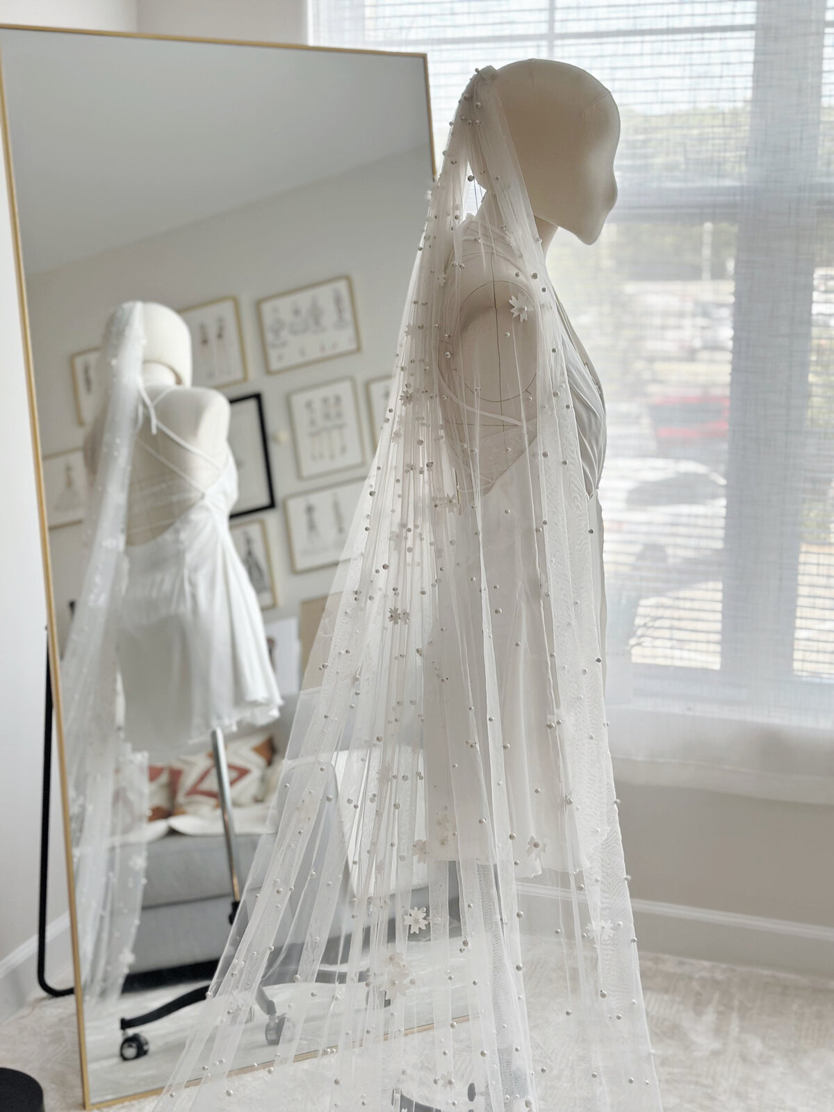 Soft tulle veil with light beaded detailing and romantic flow
