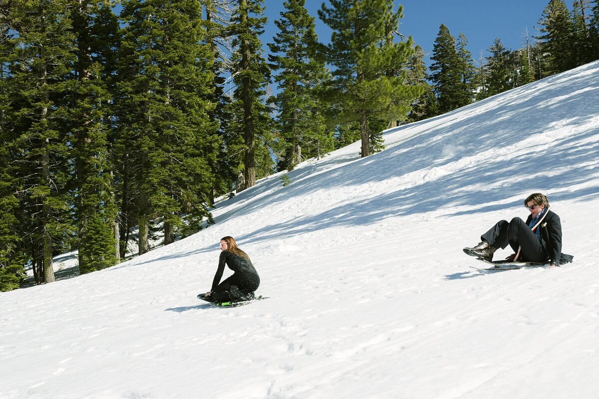 siblings elopement guests slide mountain after elopement ceremony in Alpine Meadows